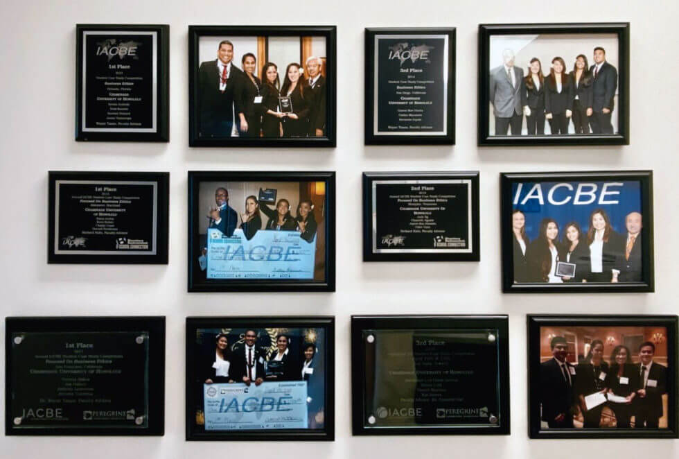 Photos of student teams and IACBE Awards received inside the School of Business and Communication